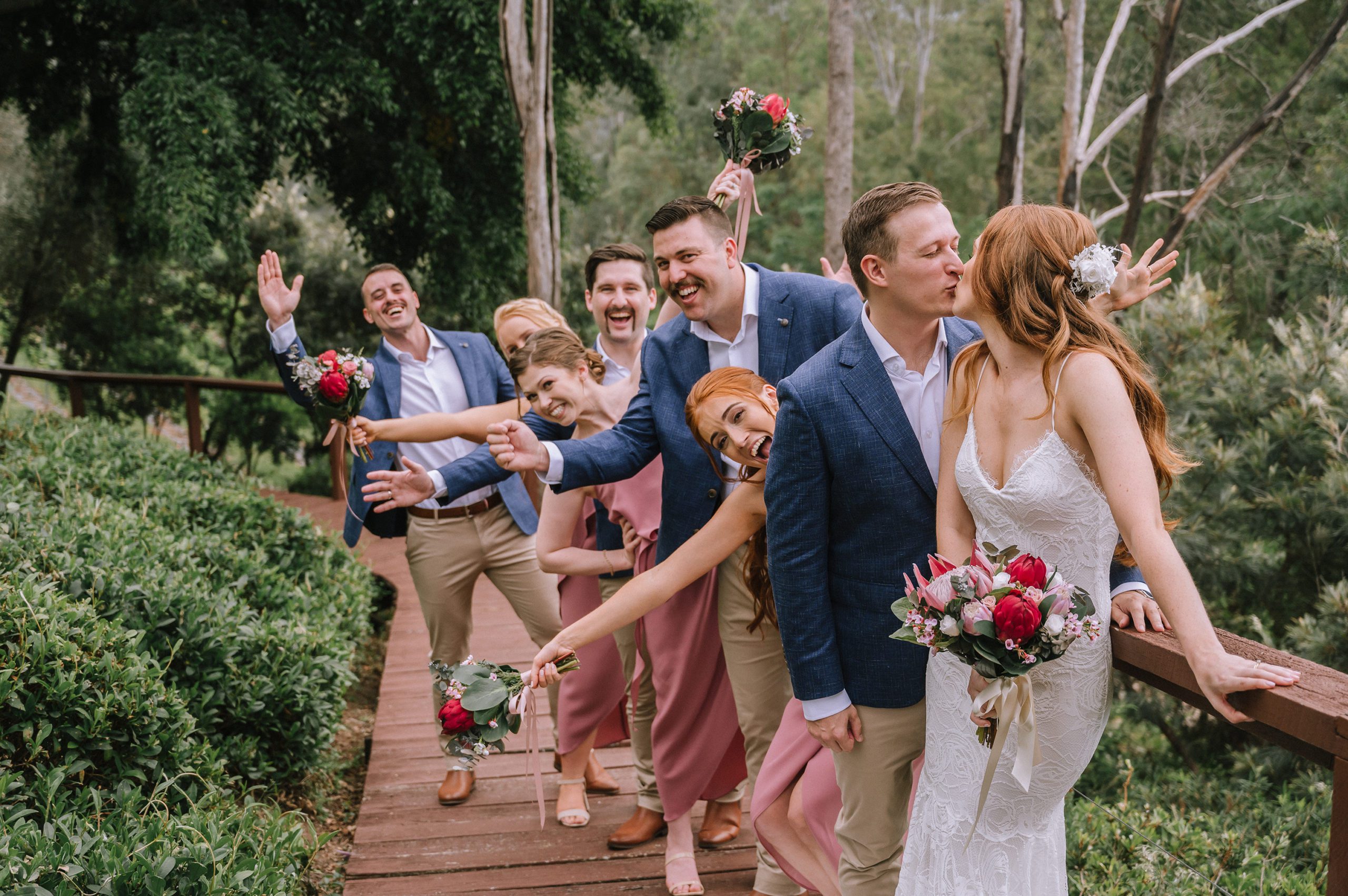 Fun and relaxed bridal party photo at hinterland Queensland wedding venue, by Tayla Jayne Photography