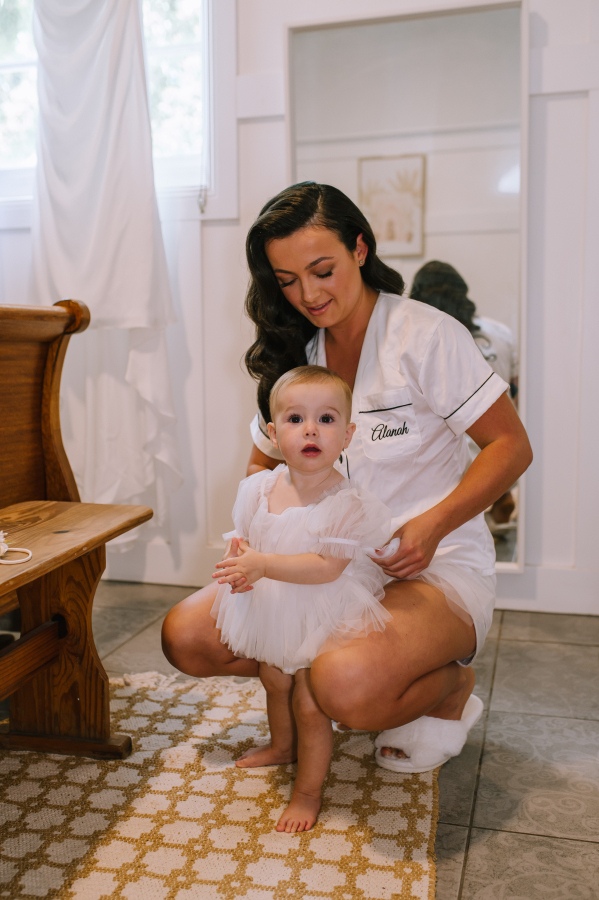 bride and daughter getting ready before ceremony at lakehouse folk
