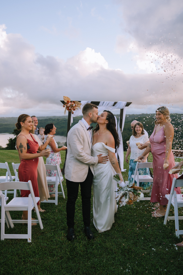 First kiss as a married couple at Lakehouse Folk elopement