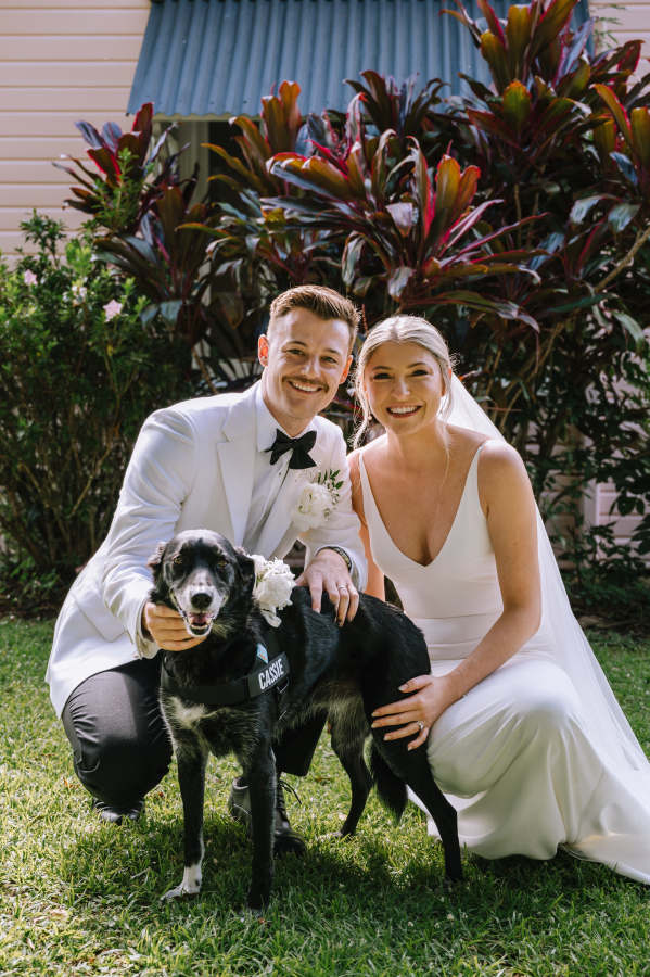 bride and groom with dog after montvale at montville ceremony