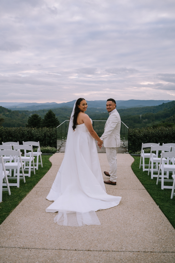 couple holding hands before wedding ceremony at the old dairy maleny