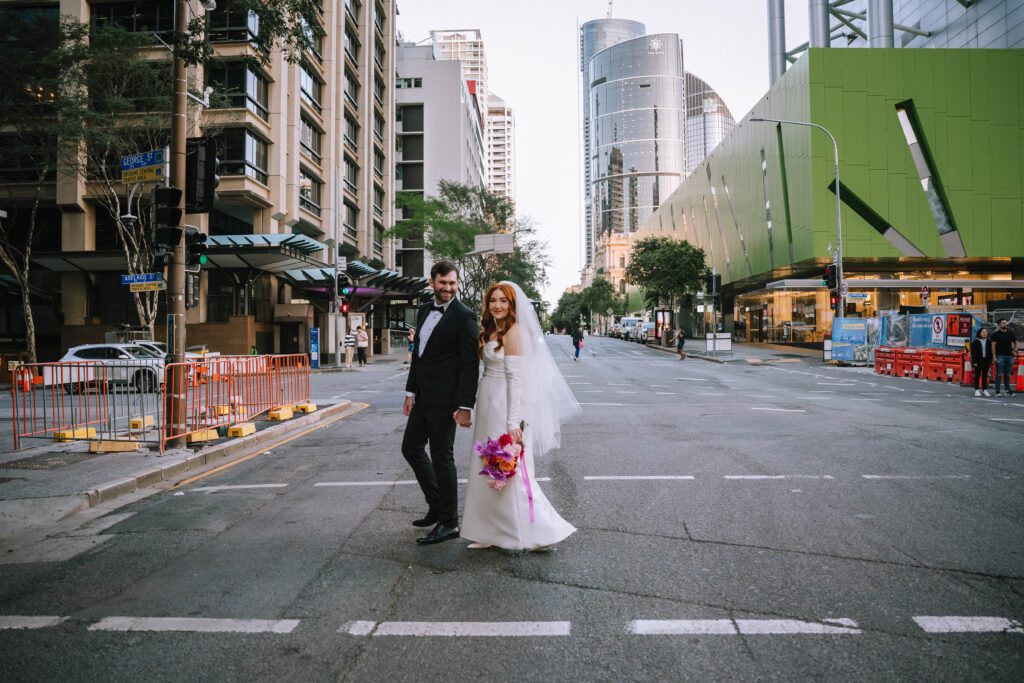brisbane wedding photography of couple walking in street