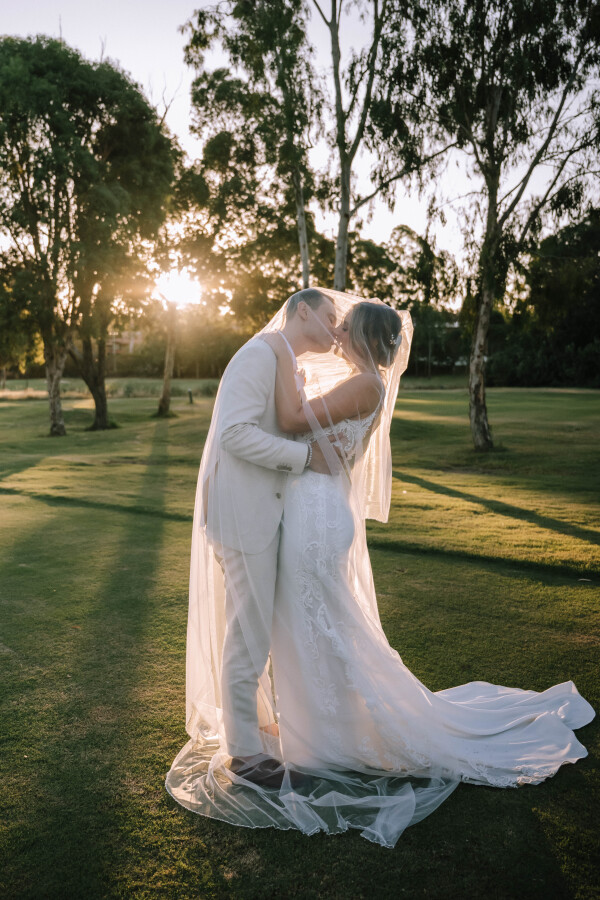 couples portrait on golf course at Hillstone St Lucia in brisbane