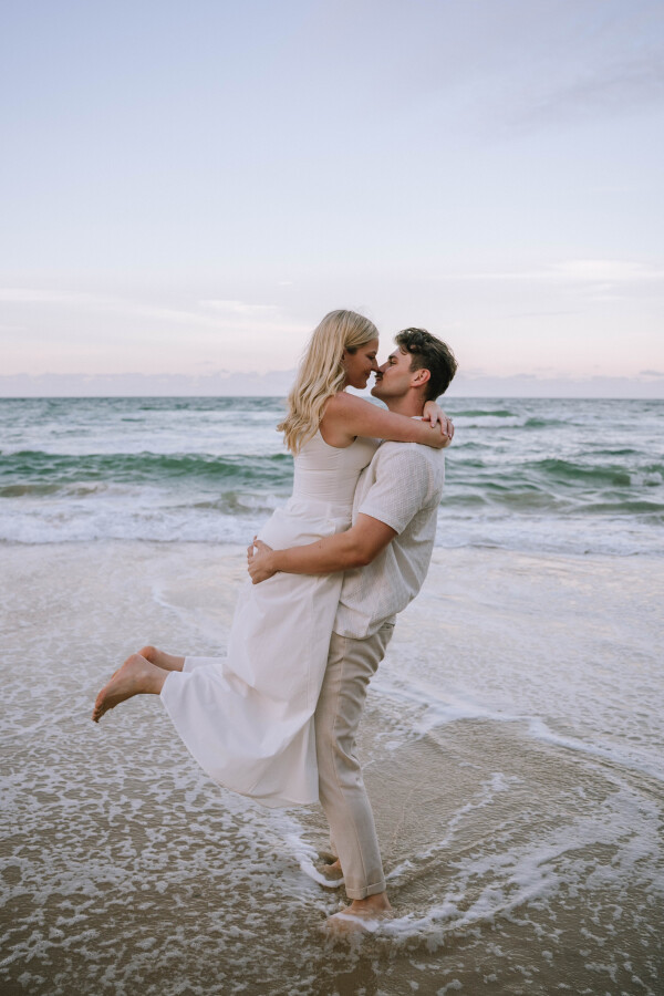 Golden hour engagement portraits on Coolum Beach