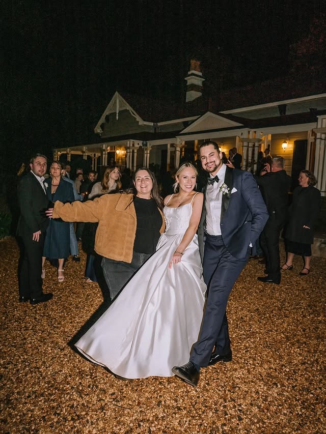 tayla jayne photography with happy couple during wedding reception on the sunshine coast