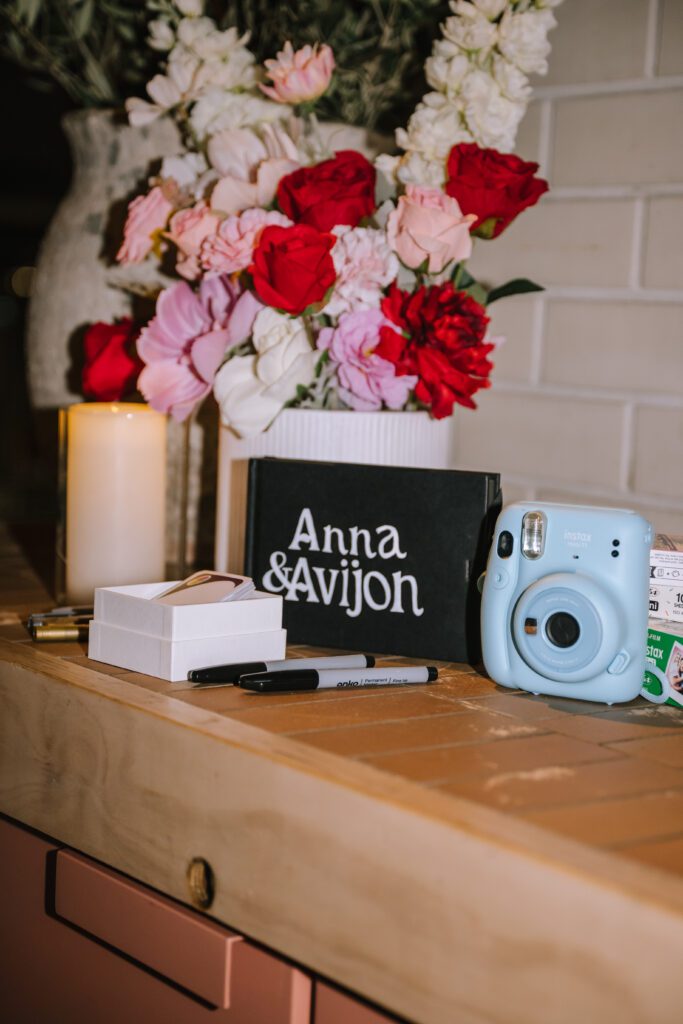 couples polaroid and notes station for guests during elopement dinner at Bianca restaurant in fortitude valley