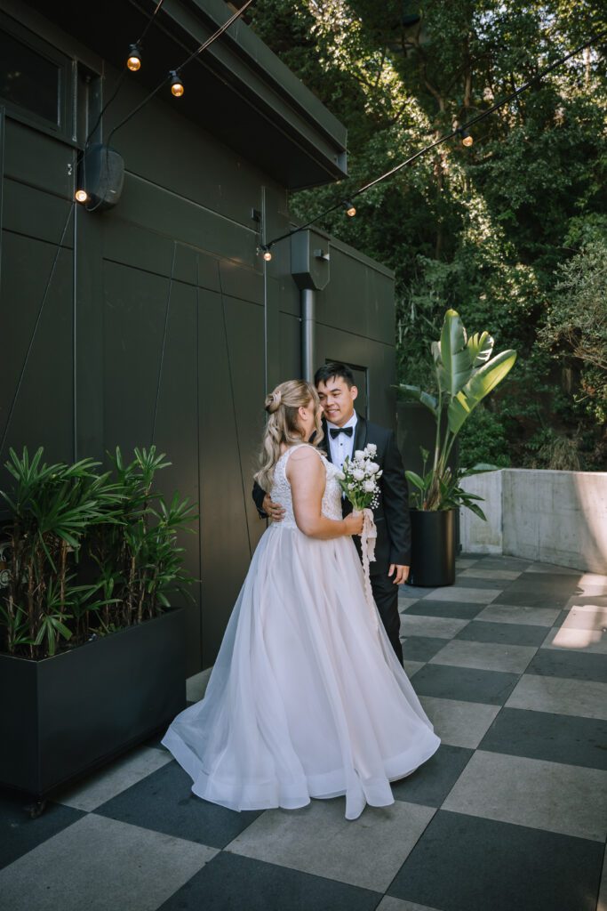 editorial portrait of couple at Crystalbrook Vincent hotel wedding venue in brisbane