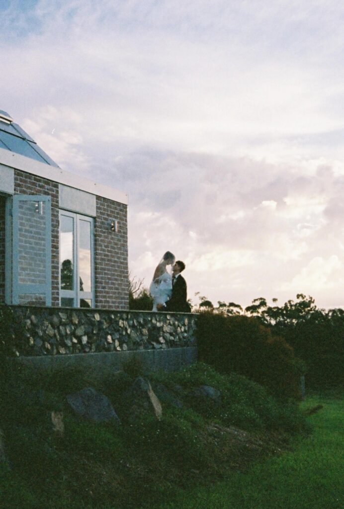 couple shot on film at goodwater ridge wedding venue in maleny sunshine coast