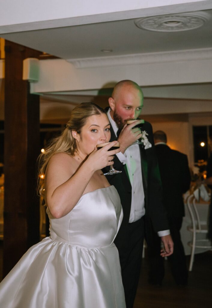 couple enjoying espresso martinis during wedding reception at maleny manor 