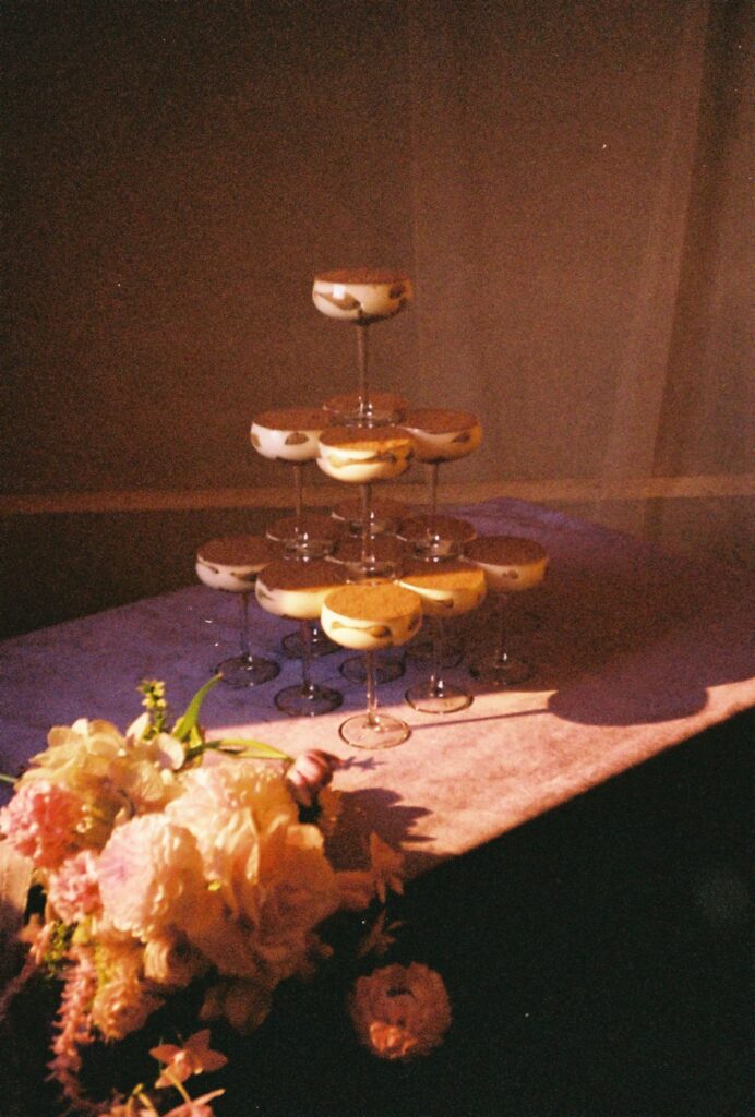 tiramisu dessert tower for wedding reception captured on 35mm film 