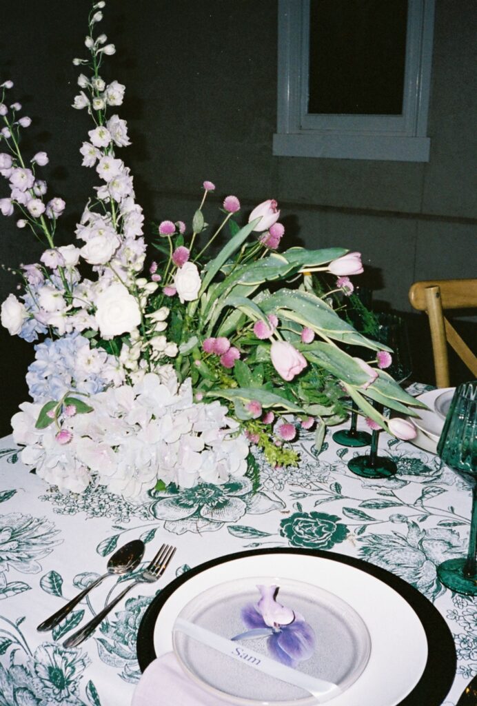 wedding reception table floral decor details captured on 35mm film 